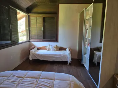 Uma cama ou camas num quarto em Casa Luxo