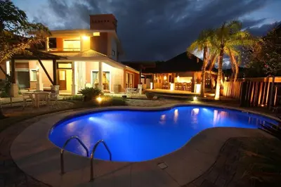 A piscina em ou perto de 5 quartos piscina e espaço Gourmet (casasmariscal)