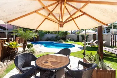 A piscina em ou perto de 5 quartos piscina e espaço Gourmet (casasmariscal)