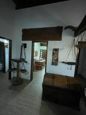 Uma cama ou camas num quarto em Casa Marrom