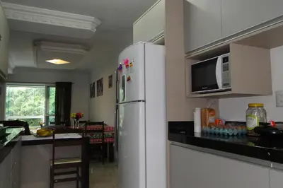 A cozinha ou kitchenette de Apartamento Bay Conceicao