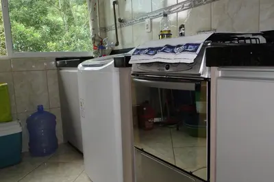 A cozinha ou kitchenette de Apartamento Bay Conceicao
