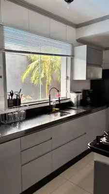 A cozinha ou kitchenette de Sobrado 4 suítes, piscina , para até 12 pessoas 650 metros da praia de Bombinhas