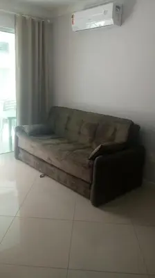 Uma área de estar em Apartamentos Mediterrâneo Home Club