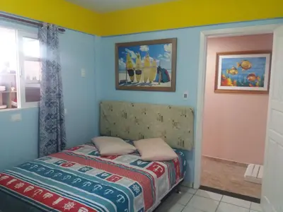 Uma cama ou camas num quarto em Residencial Samuel
