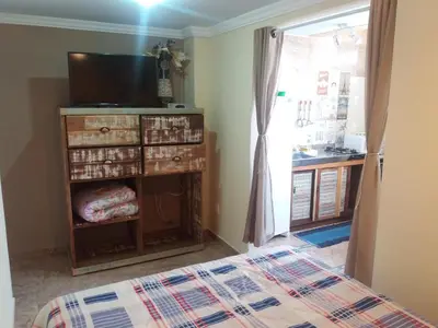 Uma cama ou camas num quarto em Residencial Samuel