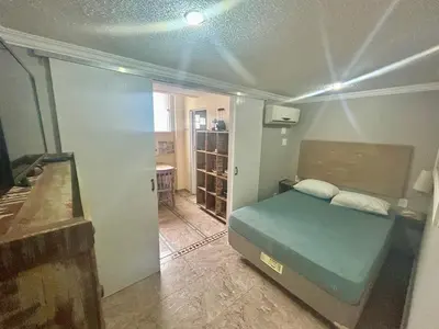 Uma cama ou camas num quarto em Residencial Samuel