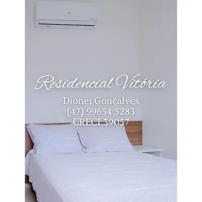 Uma cama ou camas num quarto em Residencial Vitória
