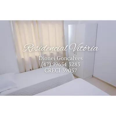 Uma cama ou camas num quarto em Residencial Vitória