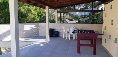 Uma área de estar em Marques Home