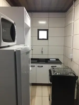 A cozinha ou kitchenette de Pousada Alessandra