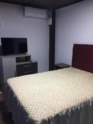 Uma televisão e/ou sistema de entretenimento em Pousada Alessandra