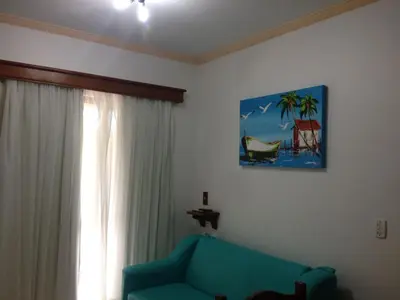 Uma área de estar em Raio do Sol Residence