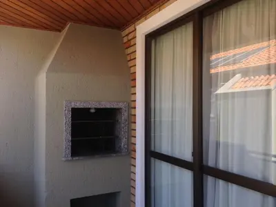 Uma televisão e/ou sistema de entretenimento em Raio do Sol Residence