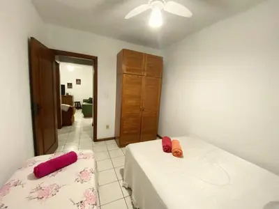 Uma cama ou camas num quarto em Apartamento - Pé na Areia