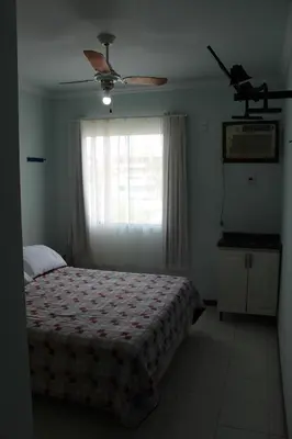 Uma cama ou camas num quarto em Residencial Jardim Palmeiras