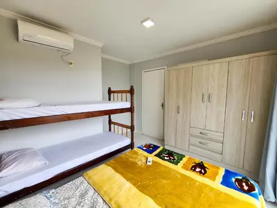 Uma cama ou camas num quarto em Apto El Shadday 202 cento e cinqüenta metros do Mar