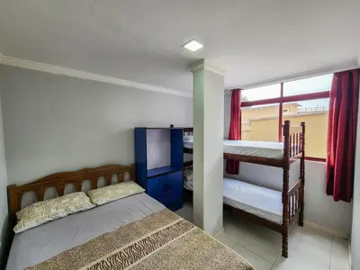 Uma cama ou camas num quarto em Apto El Shadday 202 cento e cinqüenta metros do Mar