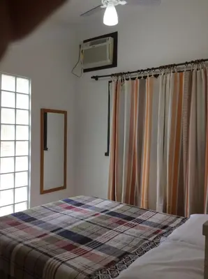 Uma cama ou camas num quarto em Residencial Annabel APTO 02
