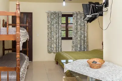 Uma televisão e/ou sistema de entretenimento em Residencial Brown