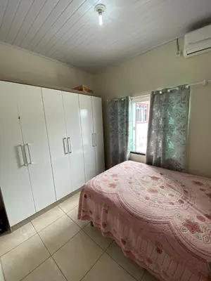 Uma cama ou camas num quarto em Casa Veraneio em Zimbros - Bombinhas