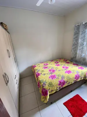 Uma cama ou camas num quarto em Casa Veraneio em Zimbros - Bombinhas