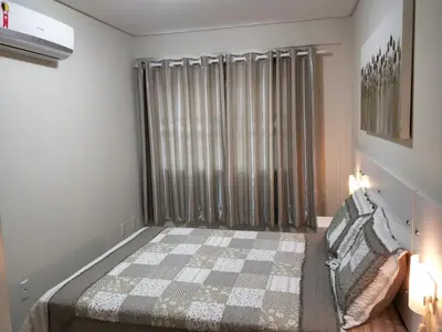 Uma cama ou camas num quarto em Don Rafael 02 dormitórios, 80m mar, Mariscal