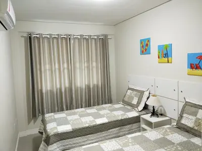 Uma cama ou camas num quarto em Don Rafael 02 dormitórios, 80m mar, Mariscal