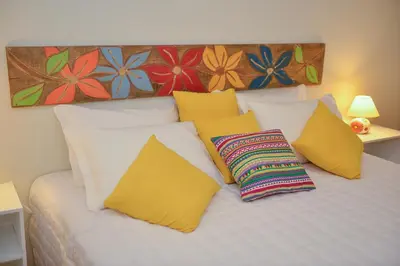 Uma cama ou camas num quarto em Pousada Dom Capudi