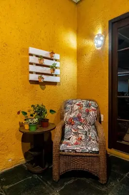 Uma área de estar em Pousada Dom Capudi