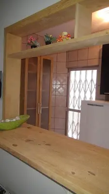 A cozinha ou kitchenette de Valentini, 30 mt do mar em Itapema