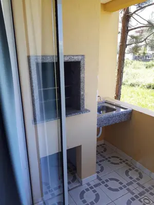 Uma televisão e/ou sistema de entretenimento em Carpe Diem Bombinhas