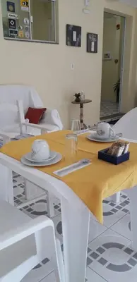 Uma área de estar em Carpe Diem Bombinhas