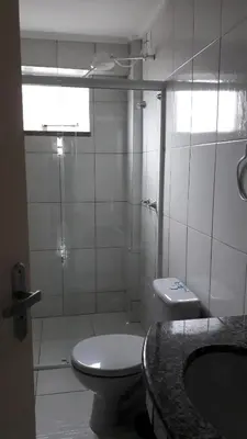 Uma casa de banho em Carpe Diem Bombinhas
