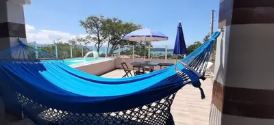 A planta de CASA COM PISCINA e VISTA PARA O MAR - Porto Belo-SC Bombinhas-SC