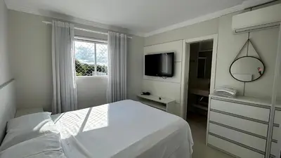 Uma cama ou camas num quarto em Apto Almeida e Moraes Aconchegante em BC