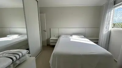 Uma cama ou camas num quarto em Apto Almeida e Moraes Aconchegante em BC