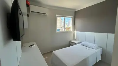 Uma cama ou camas num quarto em Apto Almeida e Moraes Aconchegante em BC