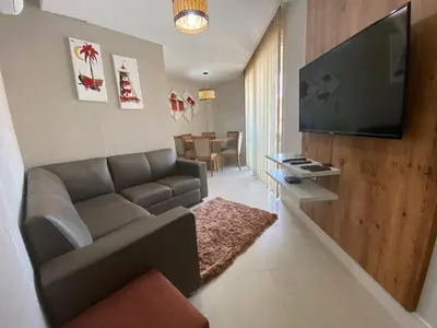 Uma televisão e/ou sistema de entretenimento em Boulevard Bombinhas - Um condomínio Completo que vai te encantar