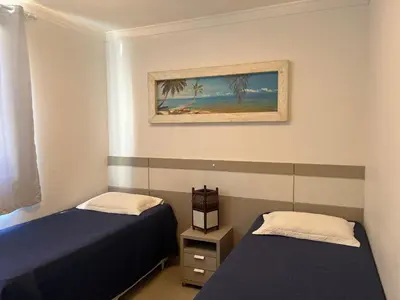 Uma cama ou camas num quarto em Res. Signus