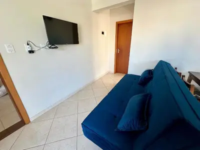 Uma televisão e/ou sistema de entretenimento em Res. Dona Olímpia