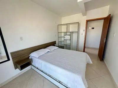 Uma cama ou camas num quarto em Res. Dona Olímpia