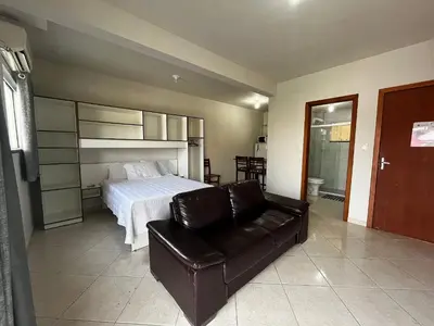 Uma cama ou camas num quarto em Res. Dona Olímpia