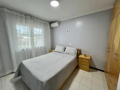 Uma cama ou camas num quarto em Res Palmeiras