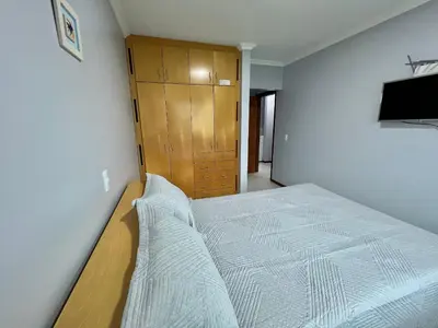 Uma cama ou camas num quarto em Res Palmeiras