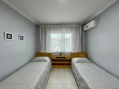 Uma cama ou camas num quarto em Res Palmeiras