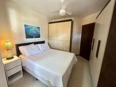 Uma cama ou camas num quarto em Res. Acapulco