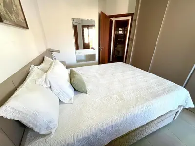 Uma cama ou camas num quarto em Res. Acapulco