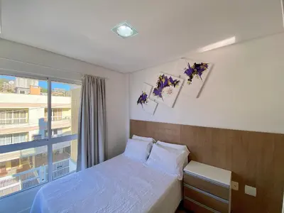 Uma cama ou camas num quarto em Res. Frederico