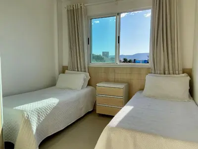 Uma cama ou camas num quarto em Res. Frederico